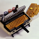 Illustration for article titled Typewriter Waffle Maker Serves Up Belgian QWERTYs